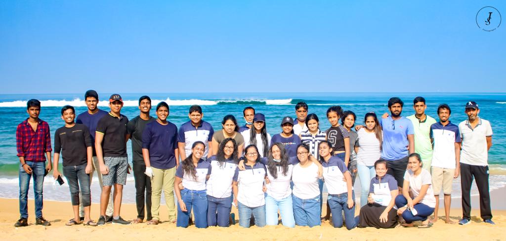 The Esala Foundation volunteers on a local beach.