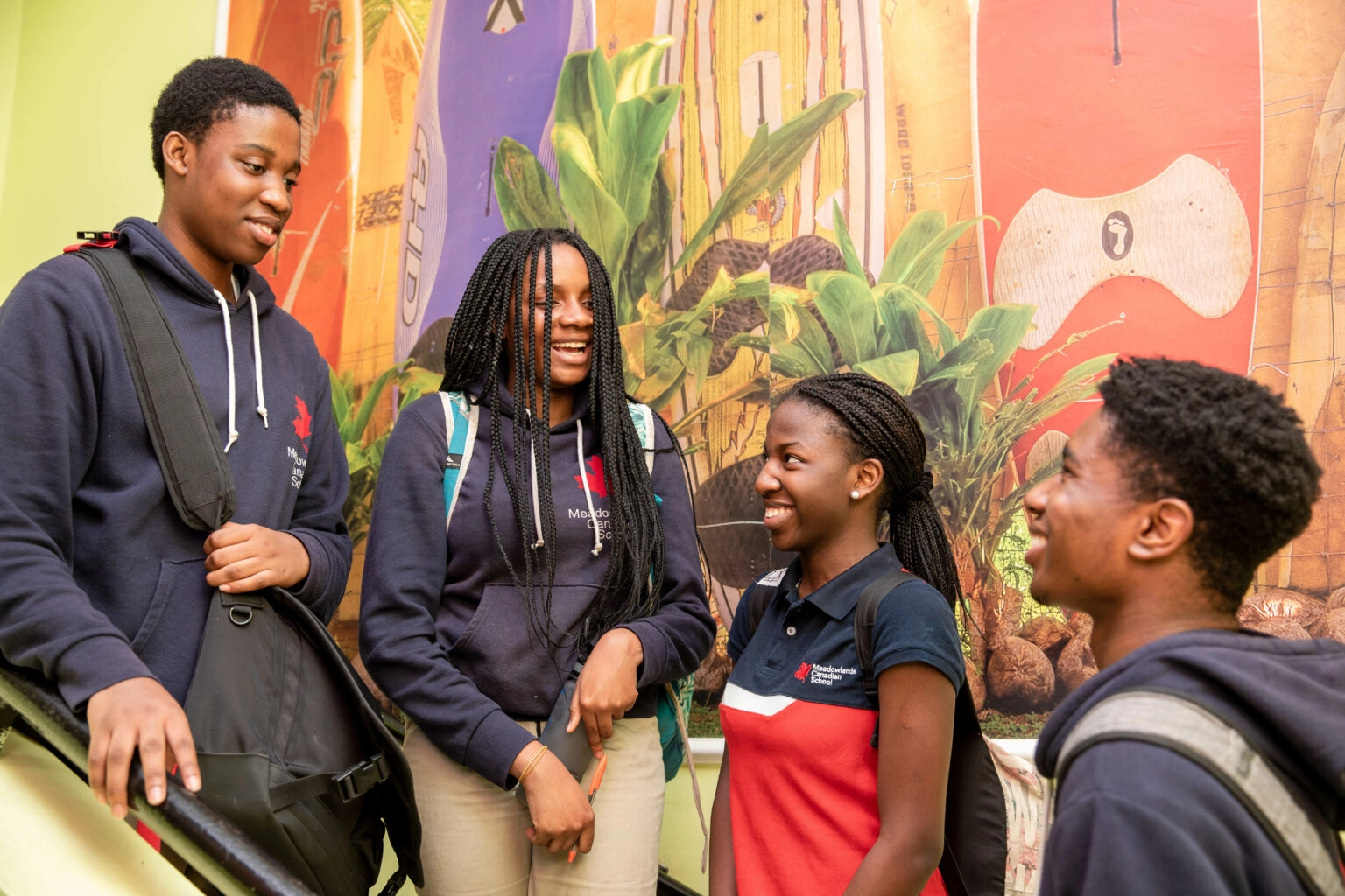 Happy Students gathered around Rosedale international high school